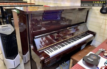 Đàn piano cơ ROLEX 100S 